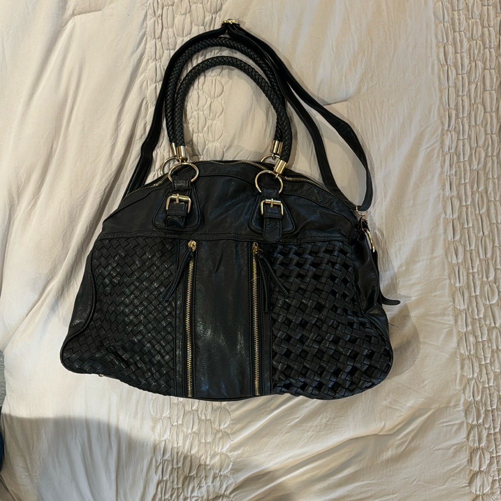 Yoki black shoulder/cross body purse with adjustable strap. Gently used